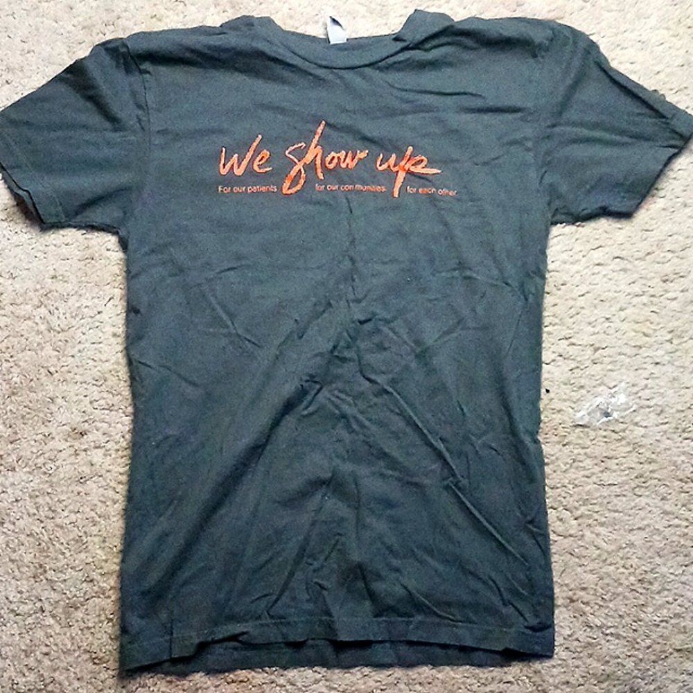 Women's HCA sponsored t shirt. Size Small.